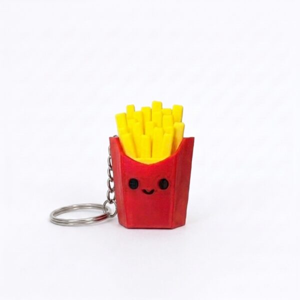 Place_papitas_keychain_on_backgr…_20260925123028 Llavero Kawaii Papas Fritas 3D – Edición Snack Feliz